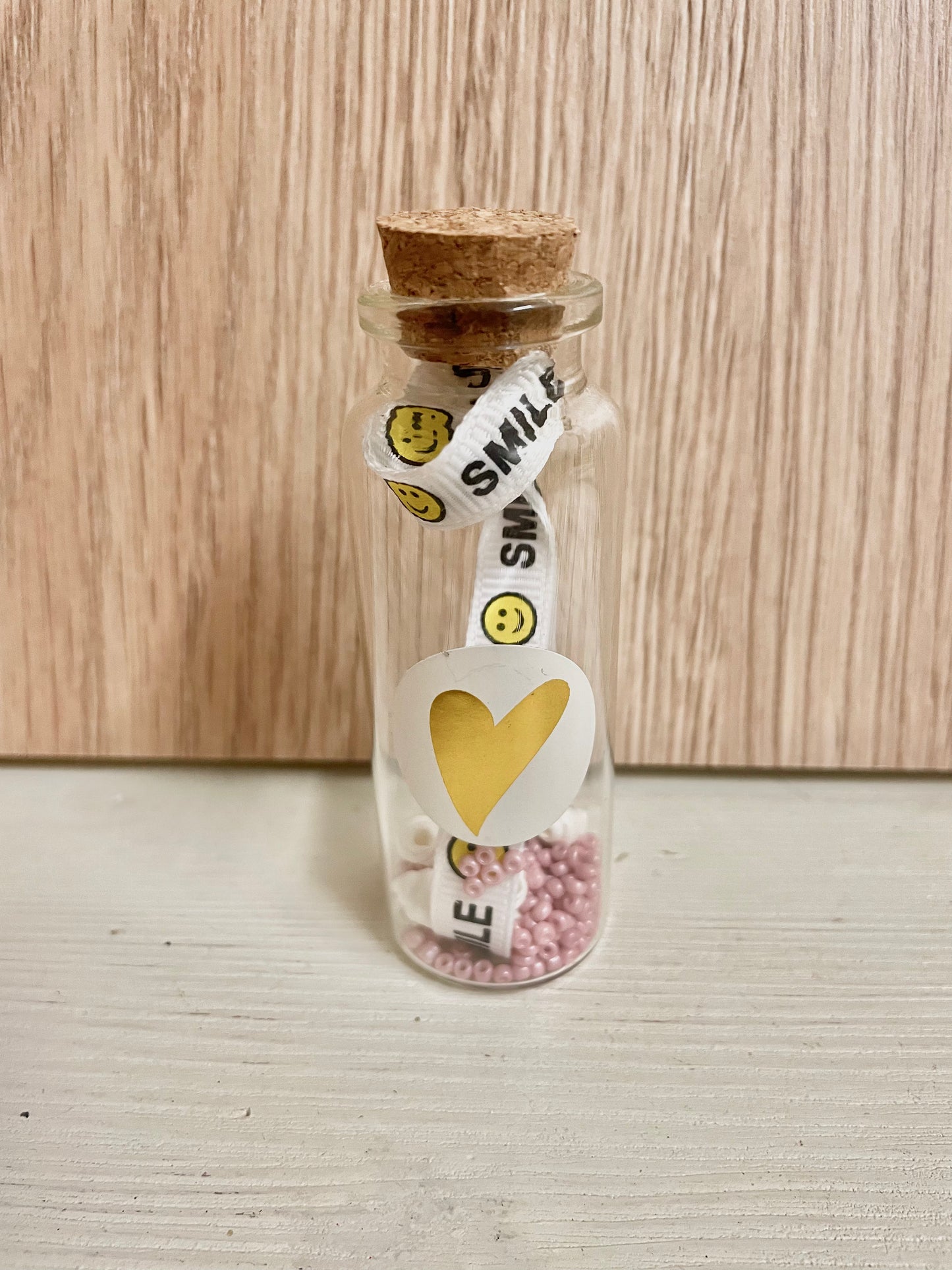 Cadeaupotje met touw armband Smile